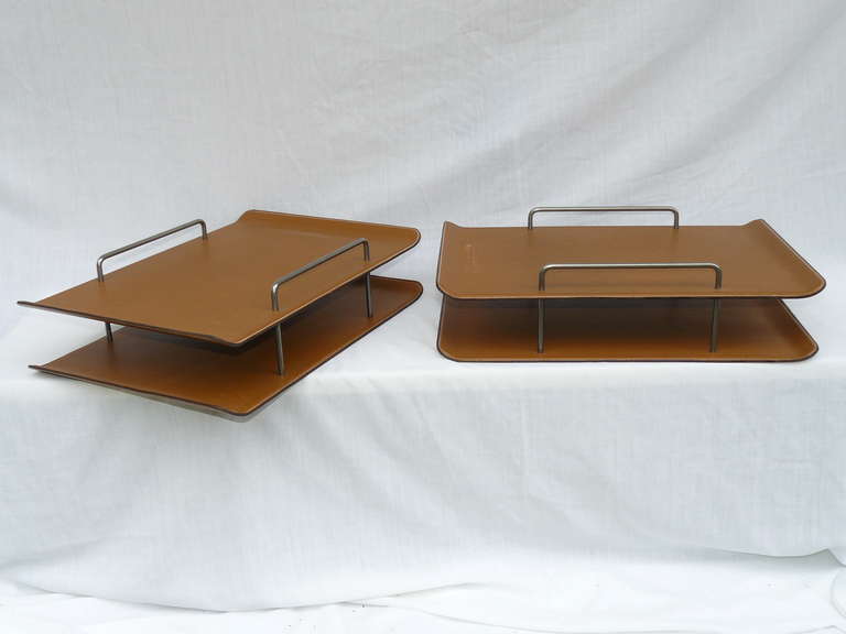 Pair of Knoll stitched leather letter trays designed by Raul de Armas and Carolyn Lu for the Knoll Palio Collection. Precisely executed with the highest quality materials, much in the same vein as Gucci. An elegant top notch desk accessory.