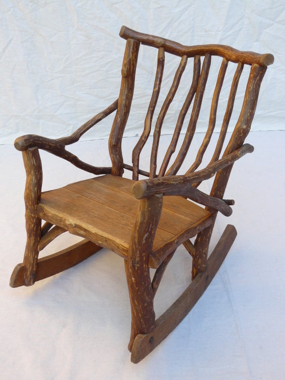 70s Artisan Hickory Rocker, well thought out construction, has a charming personality & primitive appeal.