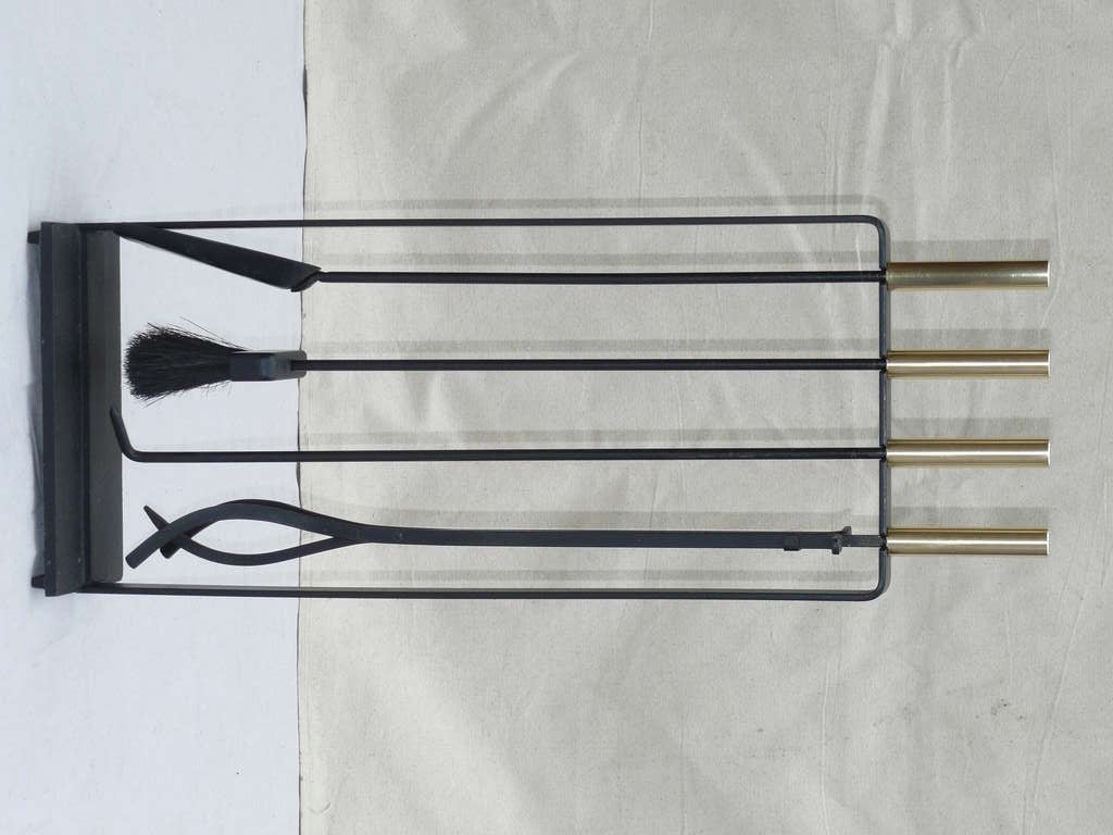 Pilgrim 60s modernist wrought iron & brass fire place tool set. Beautifully tooled, set includes a hinged log grabber, heavy cast iron base. 