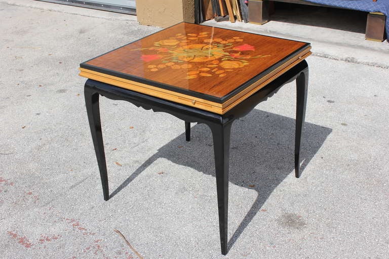 A French Art Deco Lacquered Gaming Table. The top comes off to reveal green felt area for playing cards. There are 2 versions of Checkerboards [you just flip it over]. There is another felted gaming table under that [original felt]. The use of many
