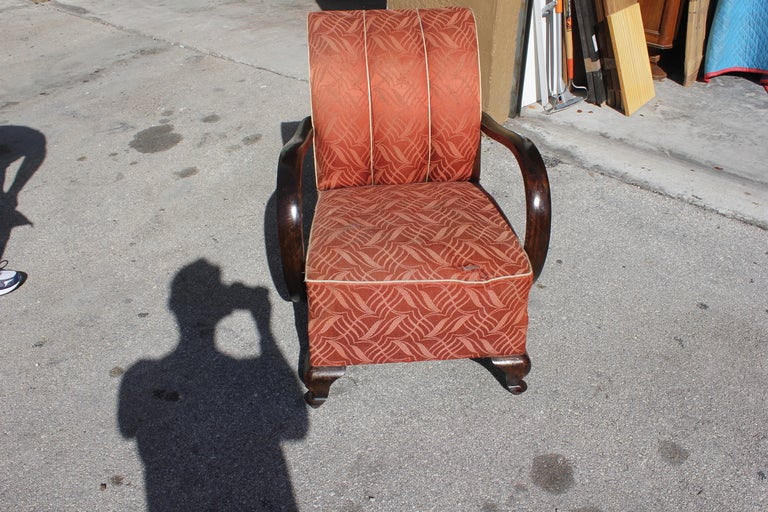 Mid-20th Century Pair of French Art Deco Curved-Arm Solid Walnut Club Chairs