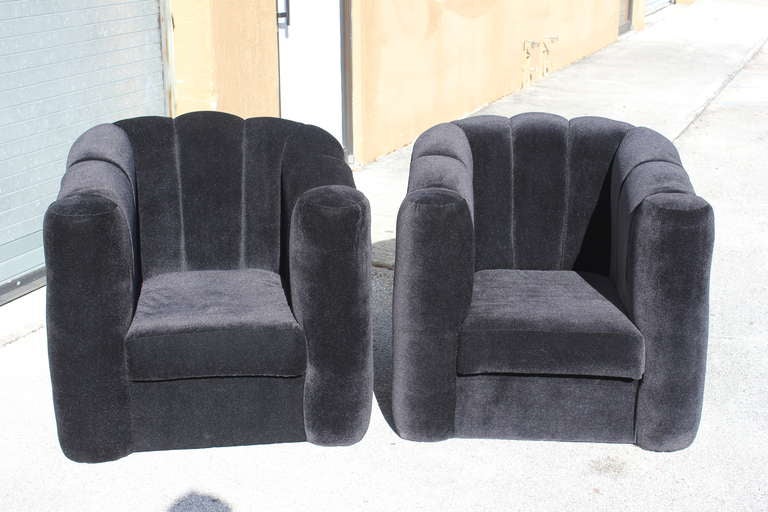 Pair of American Art Deco lightweight club chairs in black velvet. Newly reupholstered.