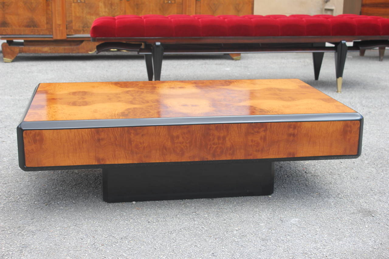 A French Art Deco burl wood and black lacquered coffee or cocktail table, circa 1940s.