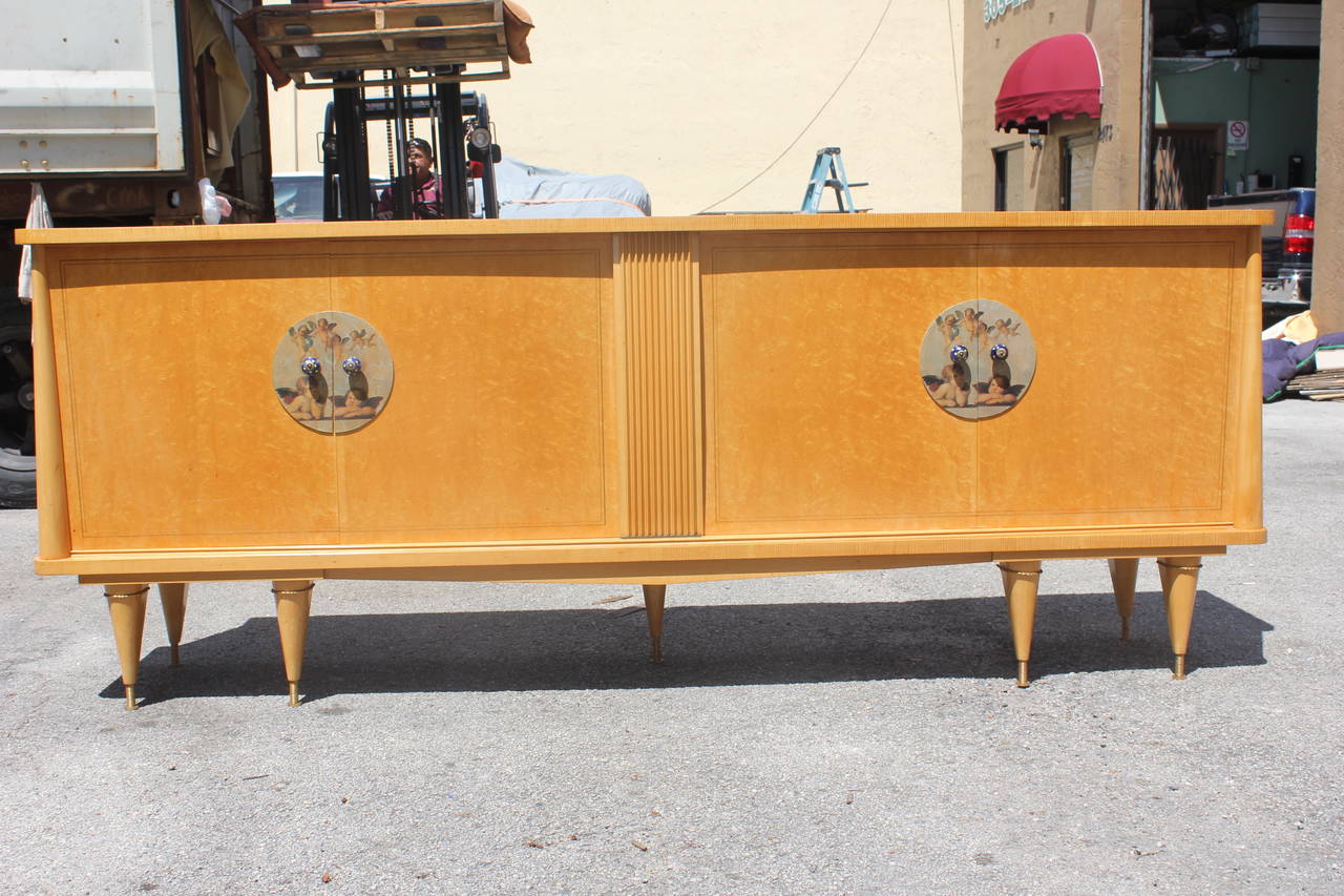 A French Art Deco Grand Burl Buffet/ Sideboard, circa 1940's. Finished interior.