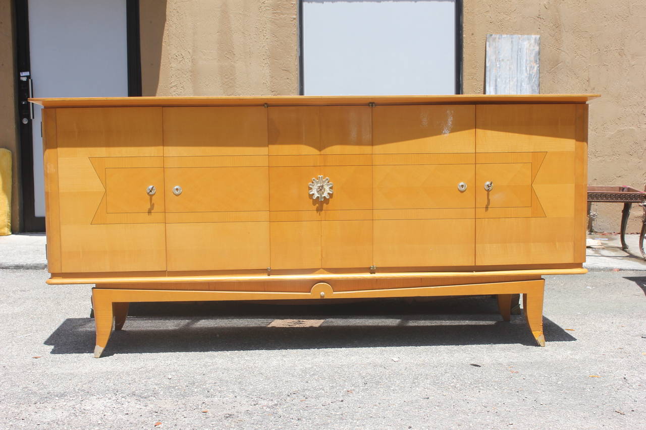 A French Art Deco Classic Sycamore Buffet/ Sideboard, circa 1940's. Center medallion.