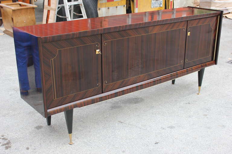 A beautiful French Art Deco dark grain buffet with mother-of-pearl detail. Interior finished, all keys present. Ready for your home!