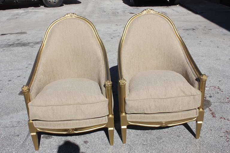 A Beautiful Pair of French Art Deco Giltwood Club Chairs, Newly Upholstered.