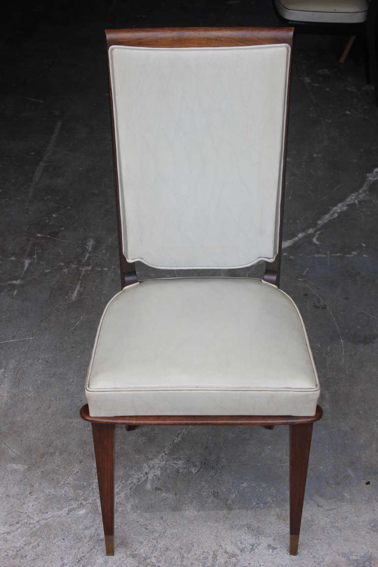 A set of 6 French Art Deco solid walnut Dining Chairs, circa 1940's. Reupholstery recommended.