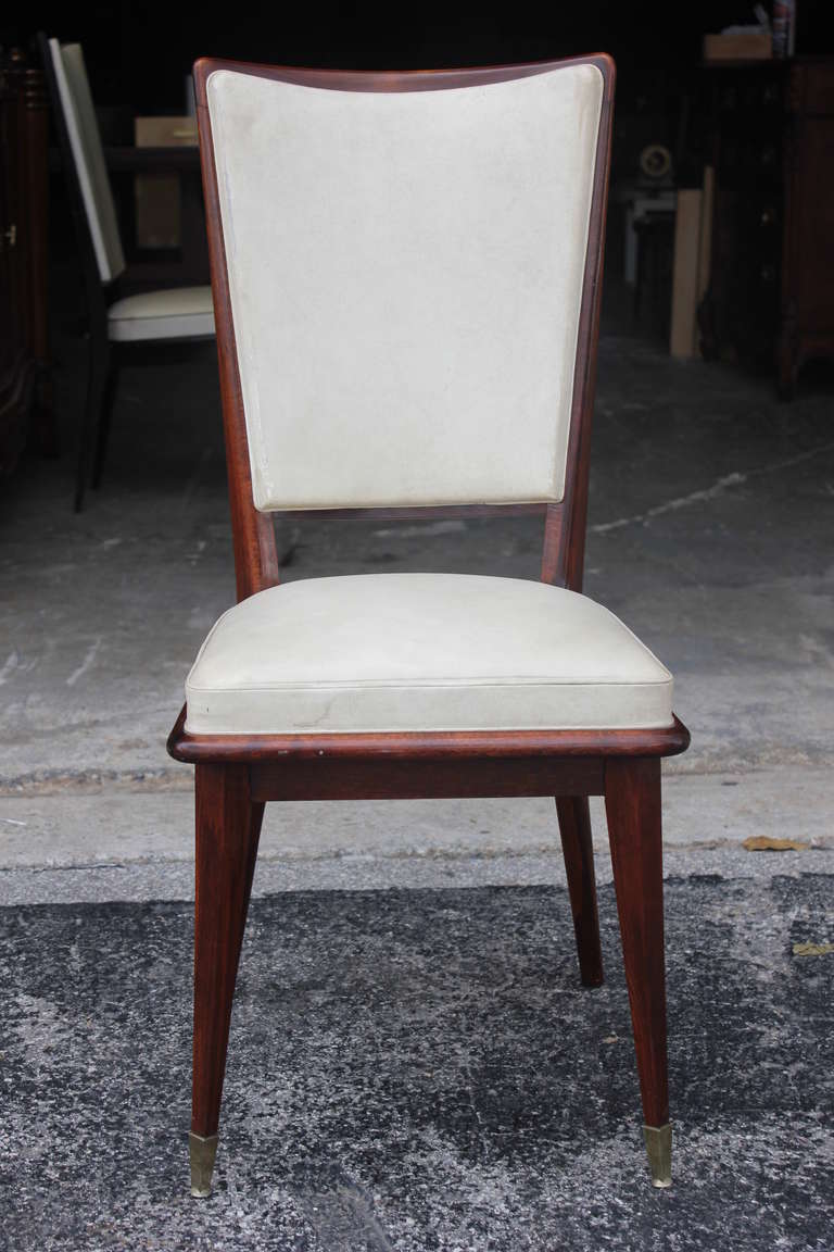 A set of 6 French Art Deco solid walnut Dining Chairs, circa 1940's. Reupholstery recommended.