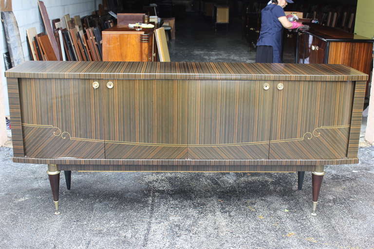 A French Art Deco Exotic Macassar Ebony Sideboard/ Buffet, circa 1940s. Finished interior, all keys present, excellent condition.