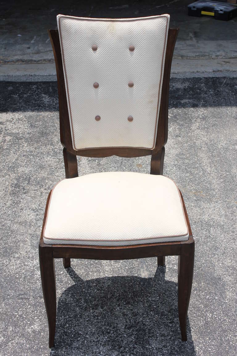 A set of 8 French Art Deco Solid Mahogany Dining Chairs, Tulip Form, Leleu Style. Reupholstery recommended.