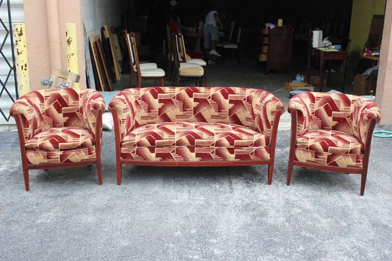 A French Art Deco Canape/ Club Chair pair set, circa 1940's in Walnut. Reupholstery recommended. Canape size is 28