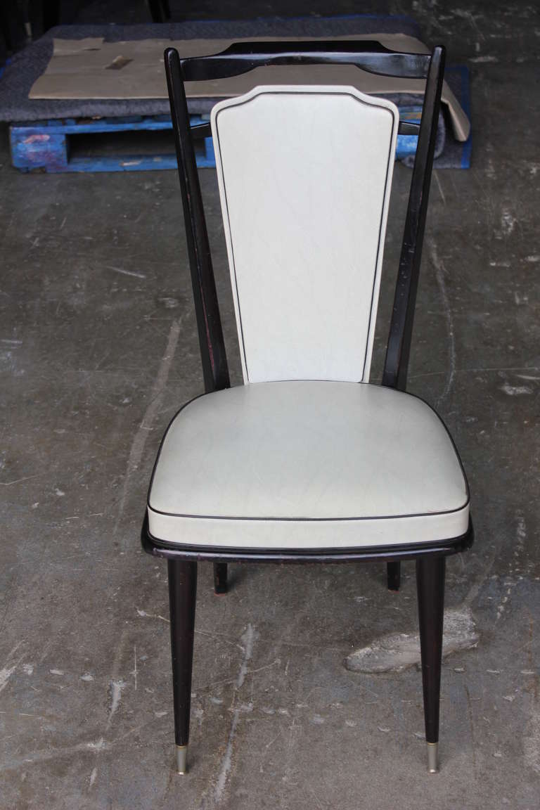A set of 4 French Art Deco Black Ebony Dining Chairs, circa 1940's. Reupholstery recommended.