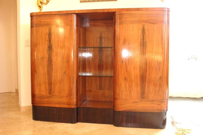 A Fantastic German Art Deco Period Tall Buffet/ Display Cabinet in Exotic Walnut with Macassar Ebony Trim. Center Display, Interior Drawers Fitted For Cutlery. 