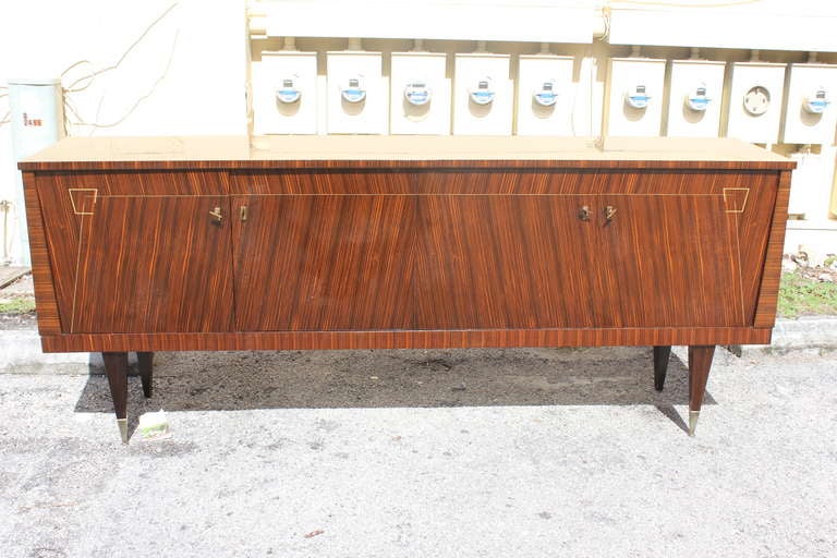 French Art Deco or art moderne exotic Macassar ebony sideboard/buffet, Finished interior, all keys present. This buffet will disassemble for easy transport if necessary.