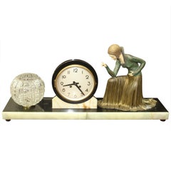 French Art Deco Patinated Metal Clock Sculpture/ Lamp "Deco Lady"