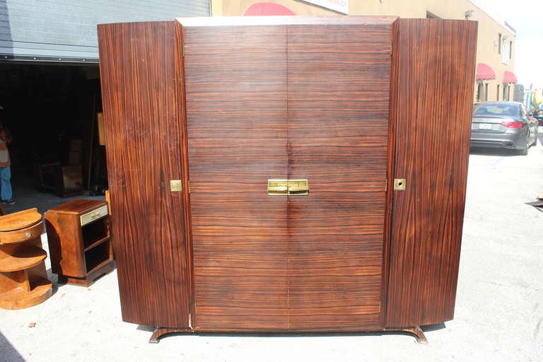 A Grand Scale Macassar Ebony Armoire/ Wardrobe, Bronze Hardware.