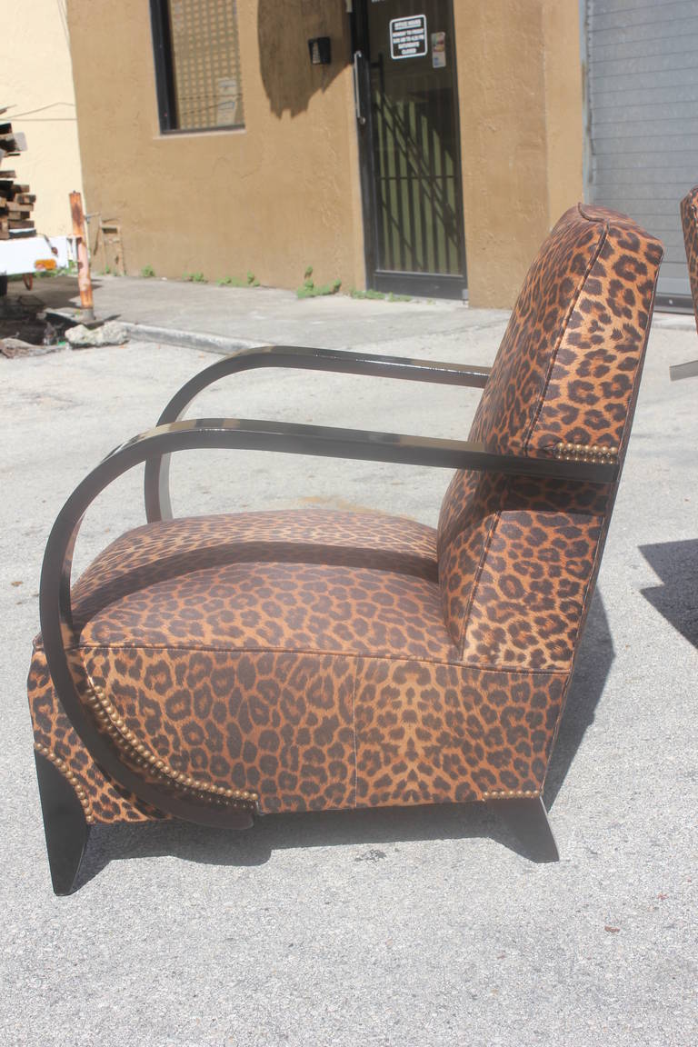 Fabric Pair of French Art Deco Black Lacquered Leopard Print Curved-Arm Club Chairs