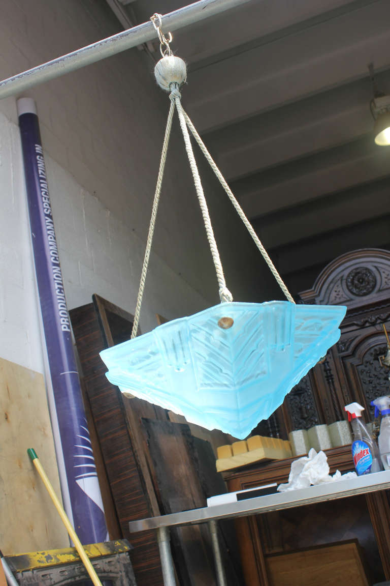 A French Art Deco Baby Blue Art Glass Suspended Fixture.