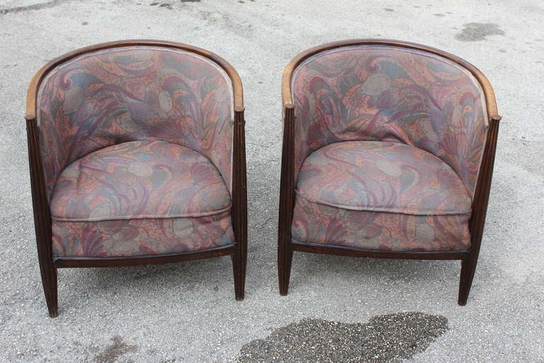 A Pair of French Art Deco Carved Walnut Club Chairs. Reupholstery recommended.