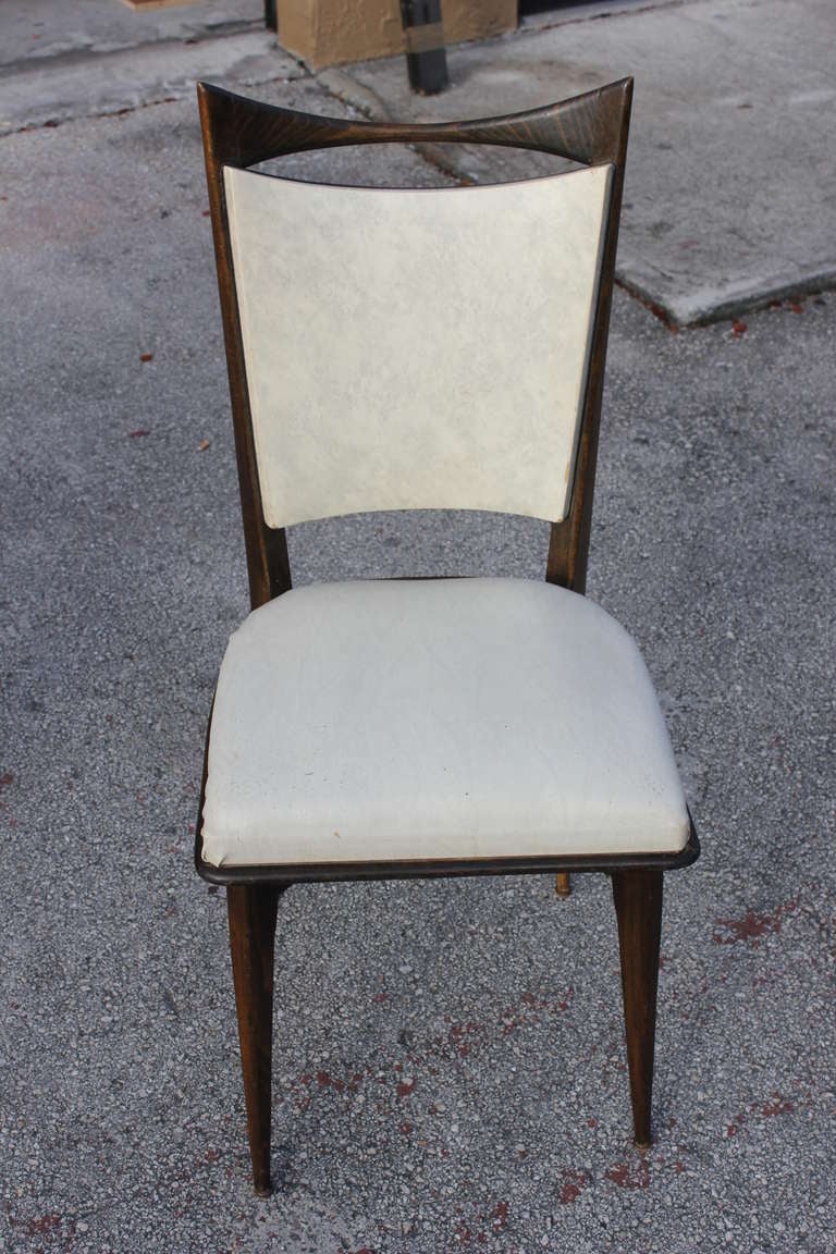 A set of 6 French Art Deco dark walnut dining chairs. Reupholstery recommended.
