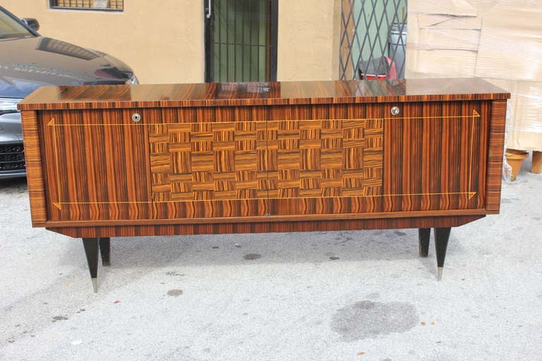 A French Art Deco exotic Macassar ebony marquetry buffet, interior finished in lemonwood. Beautiful condition.
