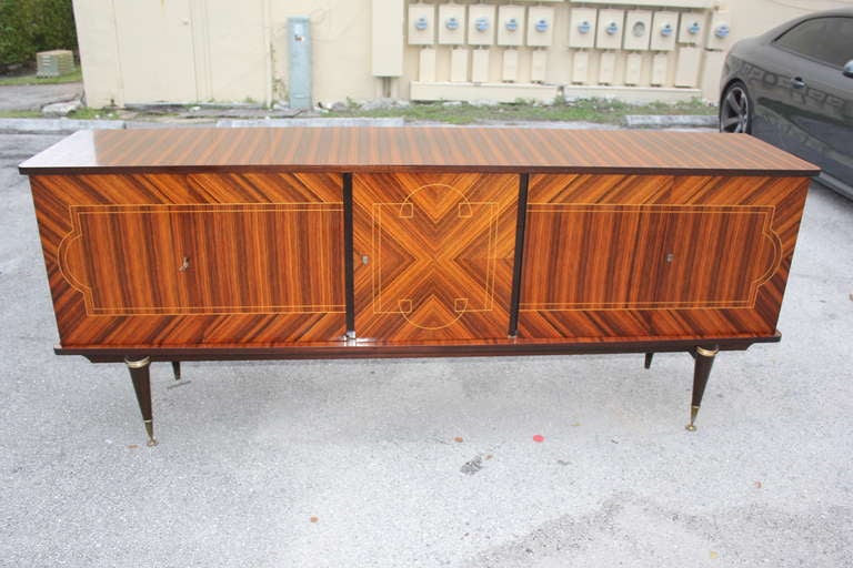 A French Art Deco Exotic Macassar Ebony Buffet, Lighter Color, Center Bar Area. Interior finished in Lemonwood.