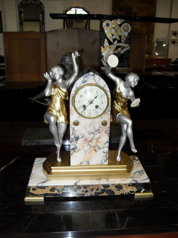 French Art Deco Period Patinated Metal Sculpture Clock 