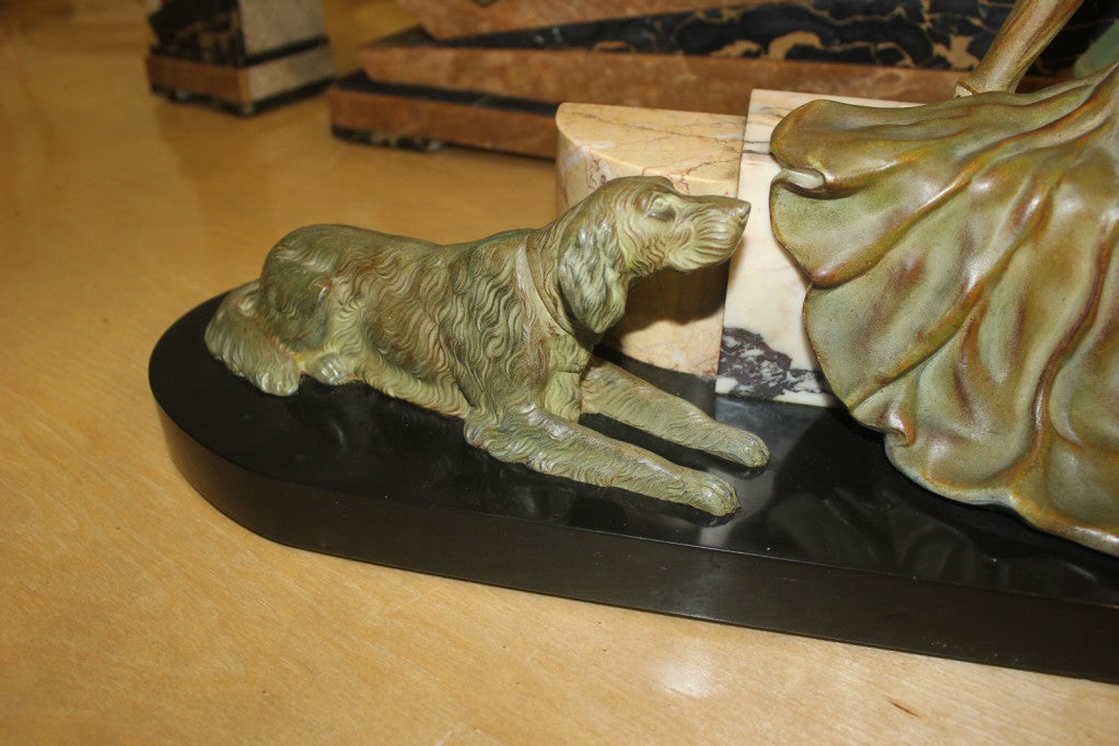 French Art Deco Patinated Metal Sculpture of Deco Lady with Dogs.