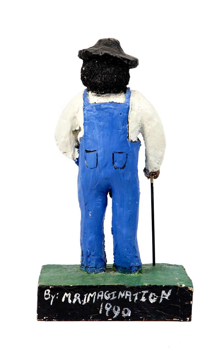 20th century farmer sculpture, plastic and enamel.