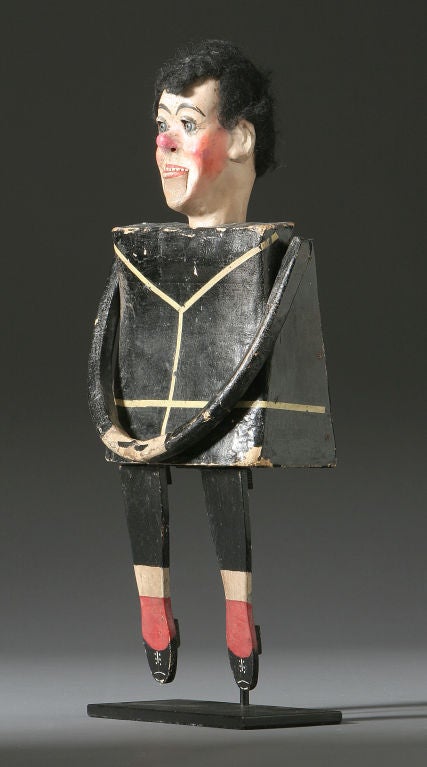 Magic Purse with Anthropomorphic Vaudeville ventriloquist<br />
Circa 1925<br />
Wood, metal, fiber and polychrome.<br />
Purse unfolds cleverly to become a puppet/ventriloquist.<br />
See: Intuitive Eye, p. 19 and<br />
American Primitive<br