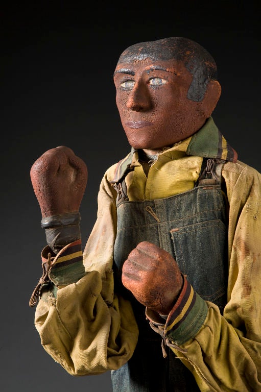 Anonymous. 
Painted rubber head and hands, original fabric
clothes and stuffed canvas body with inner 
mechanism controlling arms that punch and jab.
One in Spanish attire, other in farmer attire.  
See: American Primitive, page 178. 
Ex