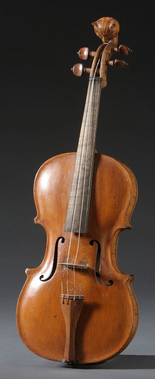 Unidentified maker.
Handmade violin with striped cat's head at top of neck.
Beautiful craftsmanship.
Ex Mendelsohn Collection.