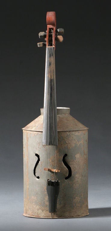 Tin Can Violin<br />
Unidentified maker<br />
Vintage milking can with applied wooden neck and metal strings.<br />
Original condition.<br />
Ex Mendelsohn Collection