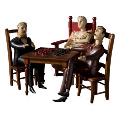 Vintage Three Figures Playing Checkers
