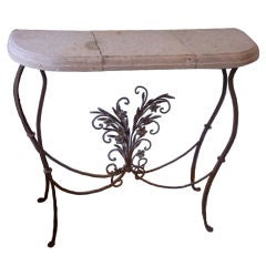 An Italian Wrought Iron Garden Console with Stone Top