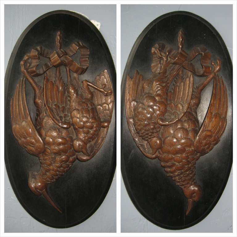 Pair of French carved walnut 