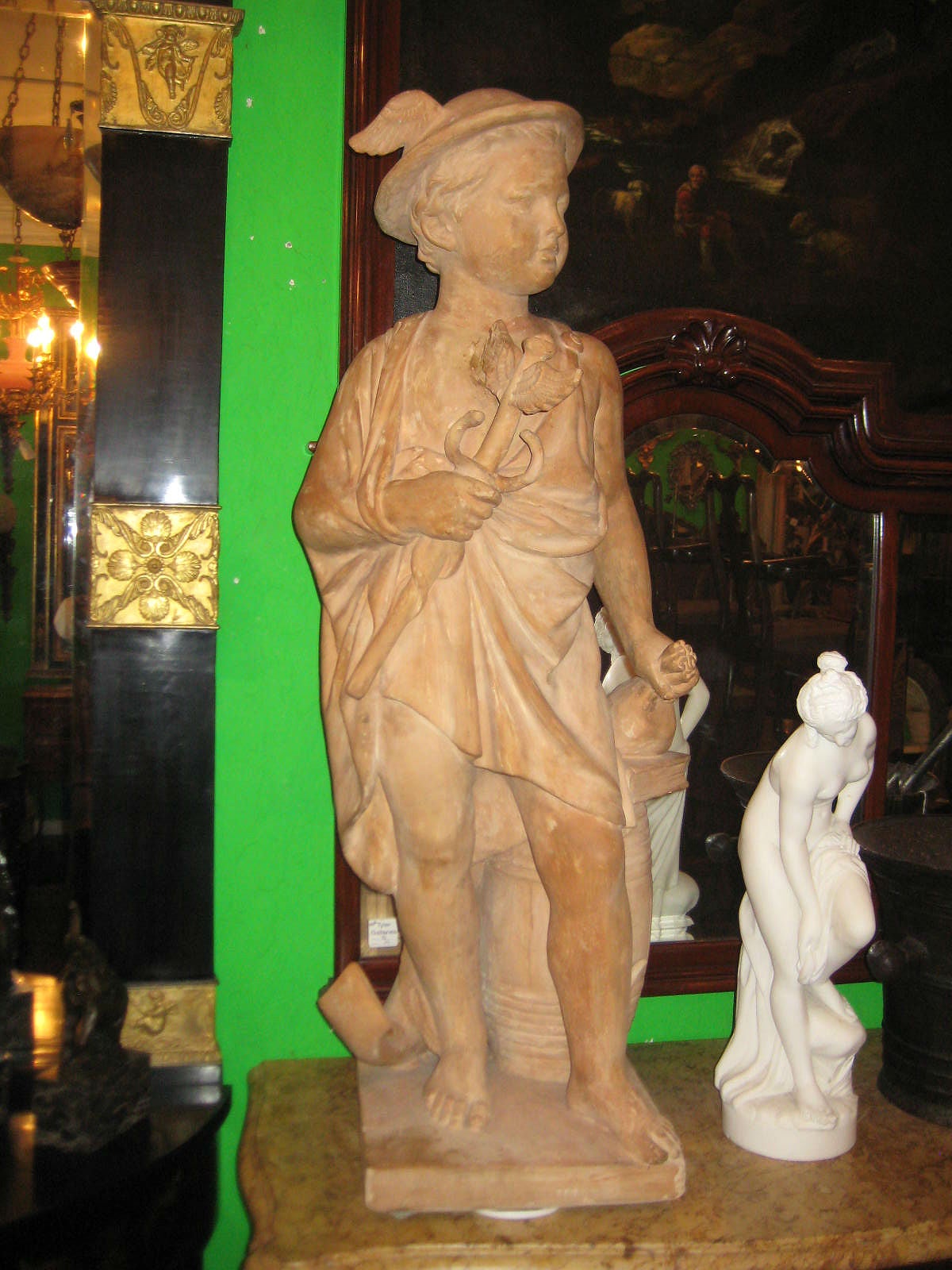 Terracotta figure of young Hermes / Mercury