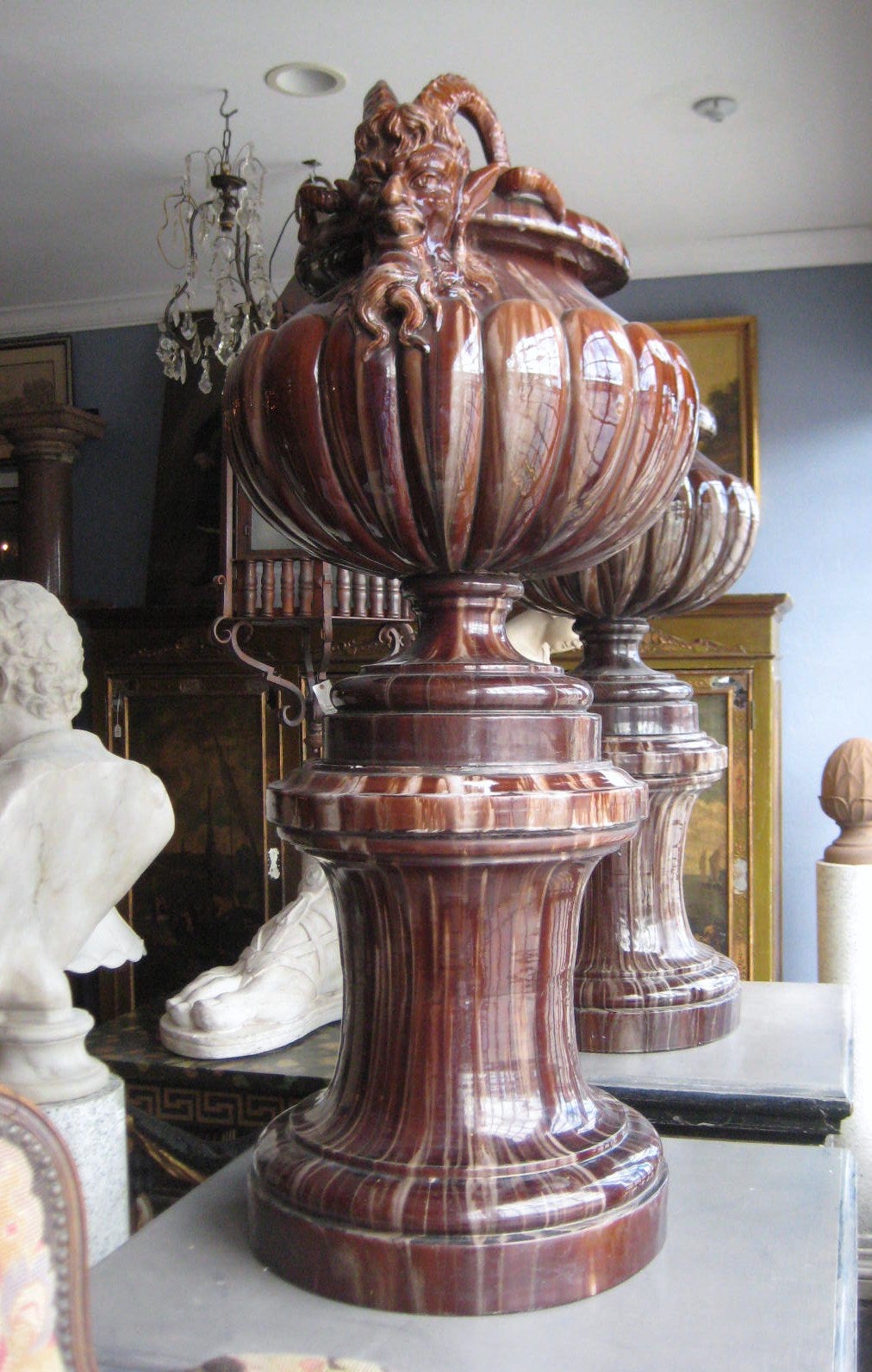 Monumental pair of 19th c. Continental Majolica urns and pedestals