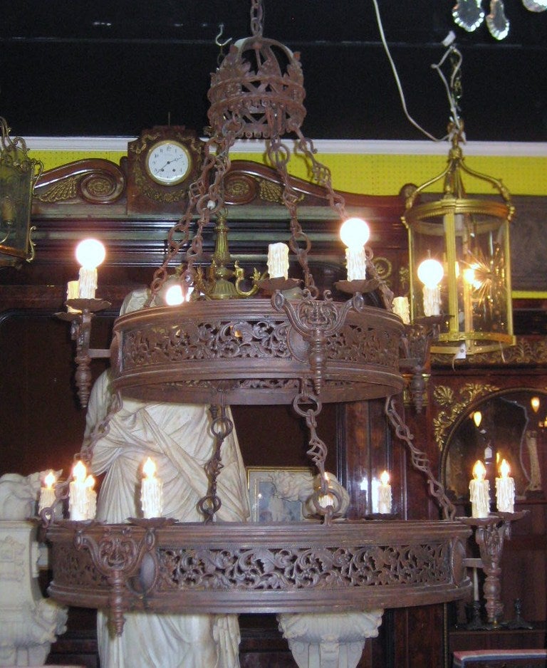 Pair of Italian Renaissance Iron Sixteen-Light Chandeliers