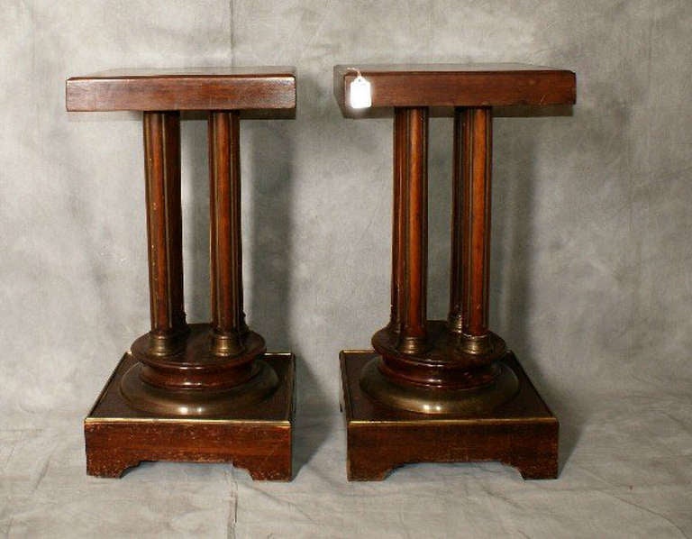 Pair of Regency Mahogany and Brass Inlaid Revolving Top Pedestals