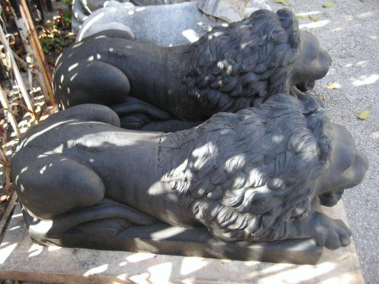 French Pair of Iron Garden Statues of Reclining Lions For Sale