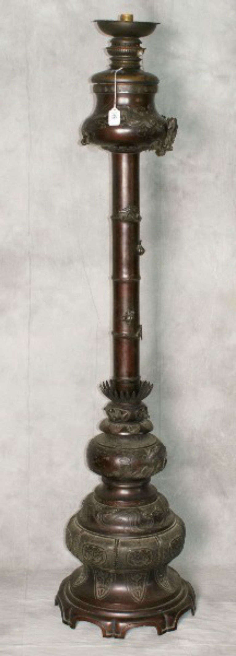 Tall Japanese Meiji Period Bronze Floor Lamp with Dragons, Birds, Snails, and other figures.