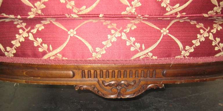 French Pair of Louis XVI Carved Walnut Wing Bergeres For Sale