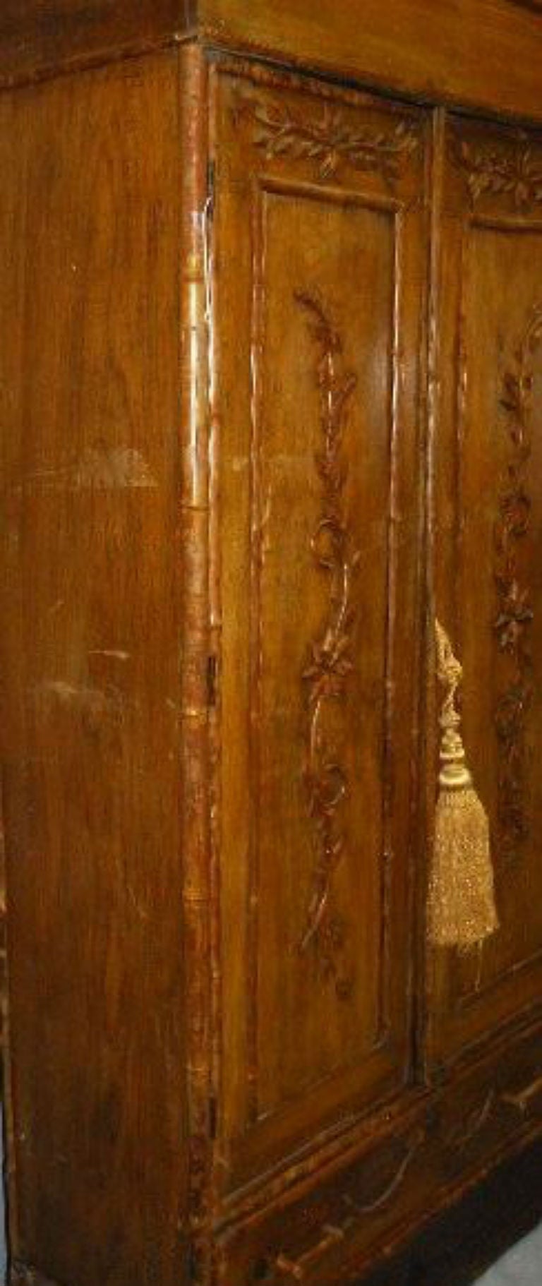 18th c. English bamboo and blonde wood two-door armoire with applied carved floral decoration.