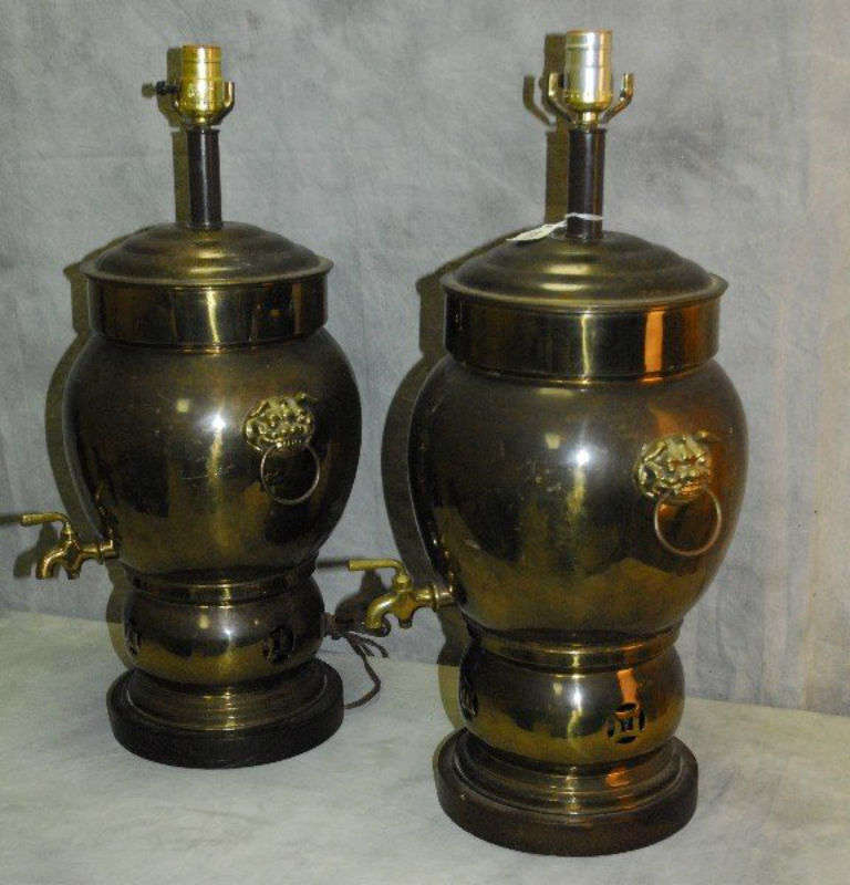 Pair of Chinese brass urns mounted as lamps with foo dog and bale handles.
