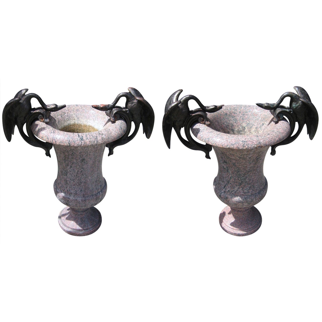 Pair of 19th Century Carved Granite Urns with Iron Swan Handles