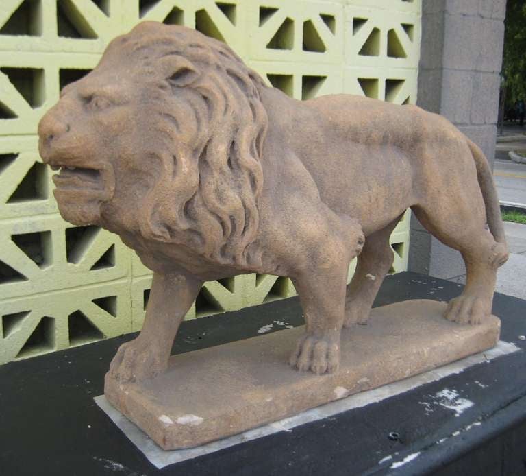 Pair of Cast Stone Garden Lions, each realistically modeled standing four square.