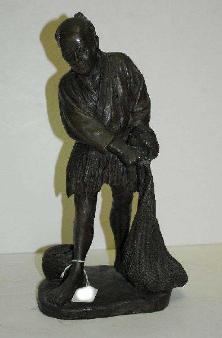 Japanese Meiji period bronze figure of a fisherman. H: 14.25