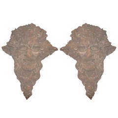 Pair of Italian cast stone masks of Bacchus